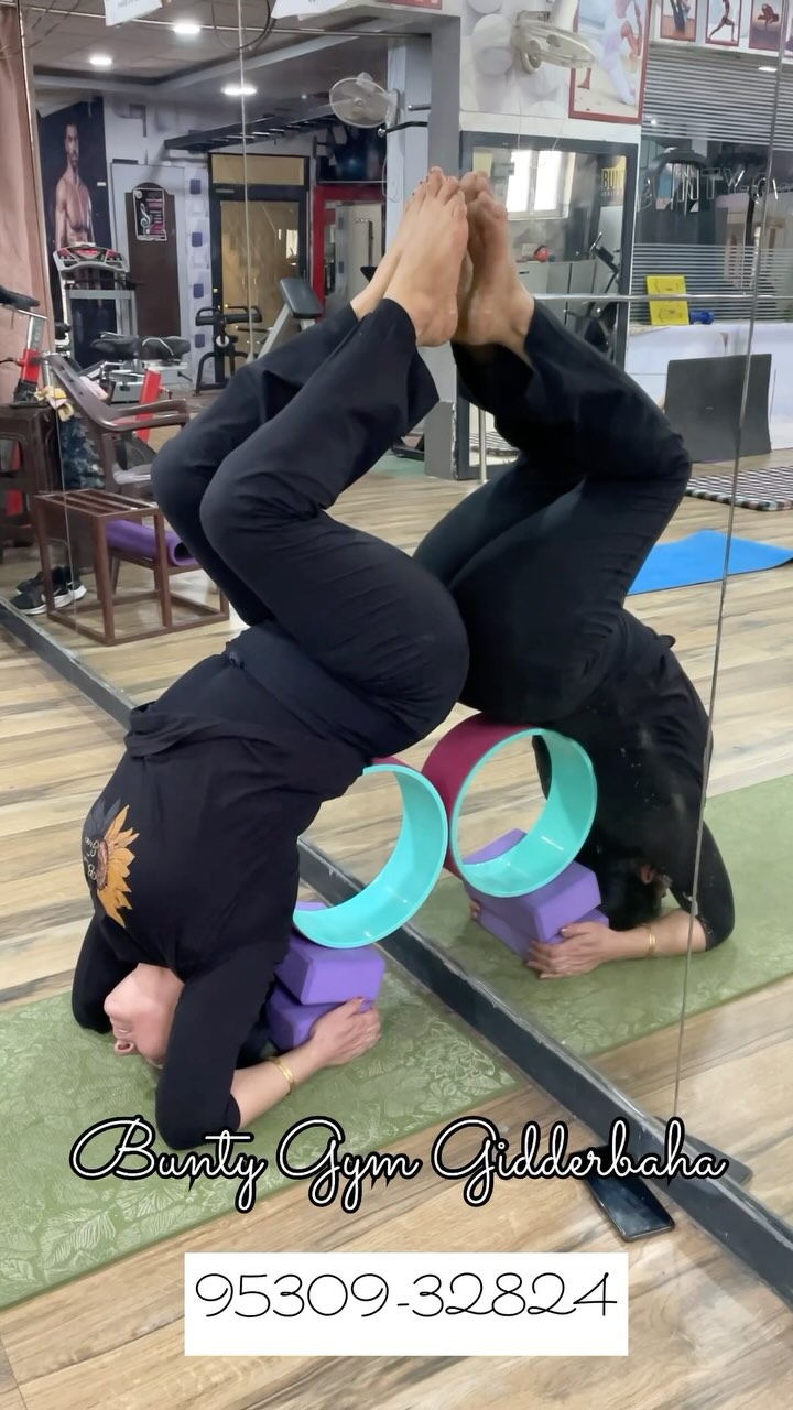 Yoga wheel headstand